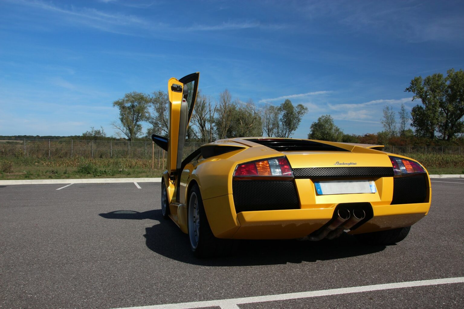yellow Lamborghini sports car
